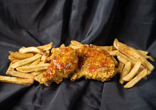 Sweet Chilli Crispy Chicken - Crispy fried chicken breast with sweet chilli sauce, lettuce, and mayo on a brioche bun